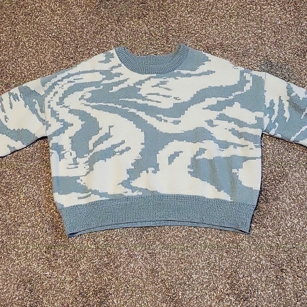 Green and white sweater